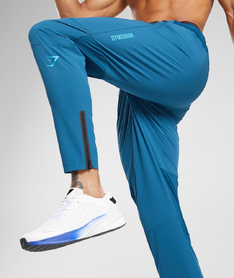 Pantalones Jogger Gymshark Híbrido Woven Hombre Azules | CO 3722JPQ